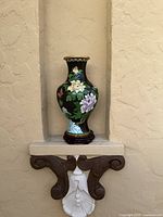 Full view of cloisonné vase on stand