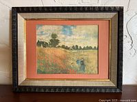 Front view of framed art print with mat and frame visible