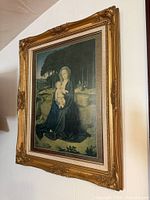 Full view of framed print hanging on wall