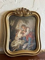 Full view of framed art print in gold-tone frame