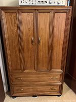 Full view of wardrobe dresser showing doors, drawers, hardware and sliders