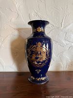 Full view of vase front on table