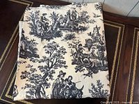 Folded Waverly Country Life toile fabric showing overall pattern