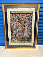 Full view of framed papyrus painting