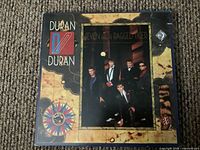 Front sleeve showing Duran Duran Seven and the Ragged Tiger cover art