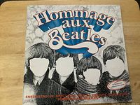 Front sleeve with Hommage Aux Beatles title and artwork