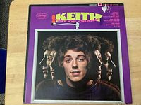 Front cover showing album artwork and label logo