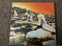 Front cover art showing children on stone terraces