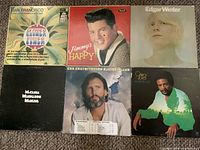 Front view of six LP sleeves