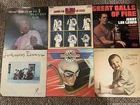 All six LP record covers displayed