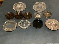 Full set of 10 ashtrays laid out