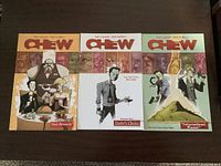 Front covers of all three Chew volumes