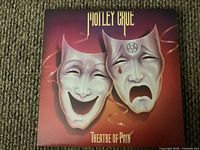Front of album jacket for Motley Crüe Theatre of Pain vinyl LP