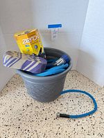 Entire lot with hose, nozzle, boxed Zero-G hose, planter, sponge