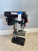 Front view of Grizzly G0925 drill press on floor