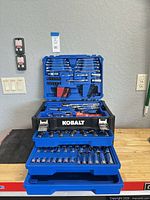 Closed and open case showing overall set layout