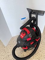Full view of Shop-Vac with hose, wands, and nozzle