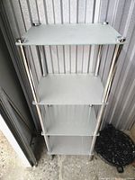 Full view of 4-tier glass shelving unit