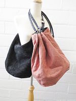 Both hobo bags displayed on mannequin to show size and style