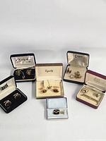 All six boxed cufflink and accessory sets grouped