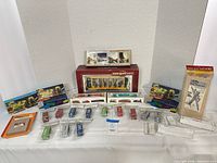 Full lot overview with boxed streetcar, kit boxes, loose car bodies and accessory packs