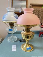 Front view of both lamps showing shades, fonts, and overall form