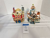 Front view of both Toontown village houses