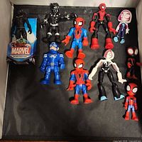 Overview of 10 Marvel figures on surface