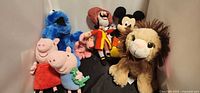 Group shot of all seven plush toys