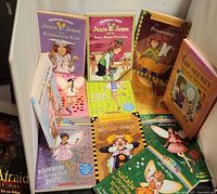 Front covers of Junie B. Jones and Rainbow Magic books laid out