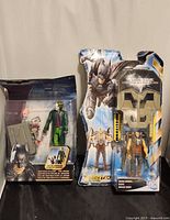 Front view of both sealed action figures