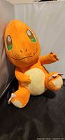 Front view of Charmander plush showing overall appearance