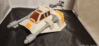 Top front view of Hasbro Star Wars Snowspeeder showing dual cannons and cockpit