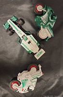 Top-down view of Hess 2003 Formula One car and two motorcycles