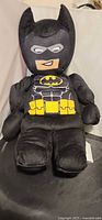 Front view of LEGO Batman plush with cape