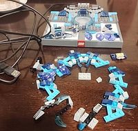 Top view of USB portal base and loose portal arch pieces spread on table