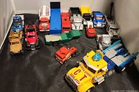 Entire group of vehicles laid out on black surface