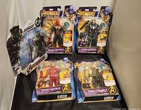 Group image of all five sealed Avengers Infinity War figures.