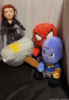Group shot of all four Marvel plush items