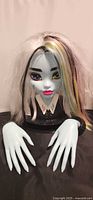 Front view of Monster High Frankie Stein styling head with hands