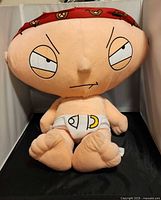 Front view of Stewie Griffin plush seated