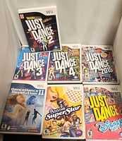 Seven Wii game cases laid out showing cover art