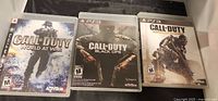 Front view of three PS3 Call of Duty game cases