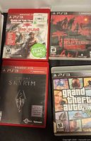 Front view of four PS3 game cases