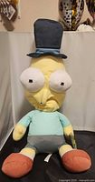 Front view of Mr. Poopy Butthole plush