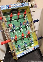 Top view of Sonic The Hedgehog foosball tabletop showing playing field, rods, player figures