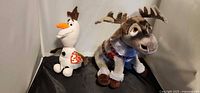 Olaf and Sven plush side by side