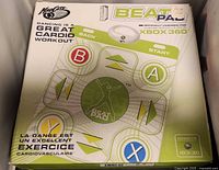 Retail box front showing Mad Catz Beat Pad branding and Xbox 360 licensing
