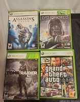 Front view of four Xbox 360 game cases