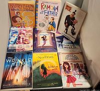 All nine books arranged in three-by-three grid